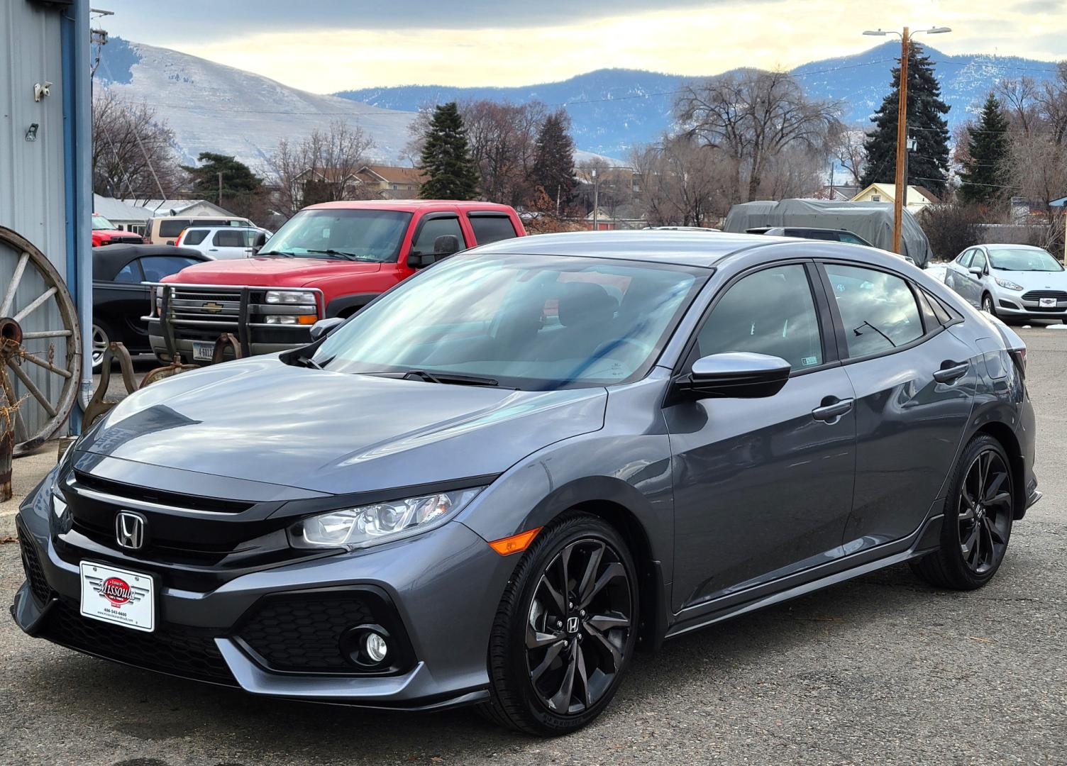 2018 Grey /Black Honda Civic Sport (SHHFK7H40JU) with an 1.5L I4 Turbo engine, Automatic transmission, located at 450 N Russell, Missoula, MT, 59801, (406) 543-6600, 46.874496, -114.017433 - Photo#1